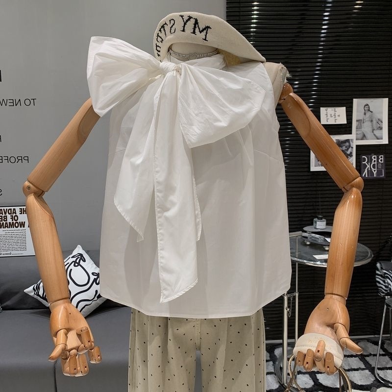 Light-luxury Chic Niche Round-neck Sleeveless Top With Tie-up Bow Detail 1 Light-luxury Chic Niche Round-neck Sleeveless Top With Tie-up Bow Detail