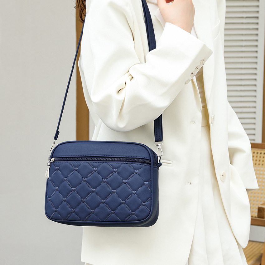 Large-Capacity Multi-Compartment Crossbody Bag 1 Large-Capacity Multi-Compartment Crossbody Bag